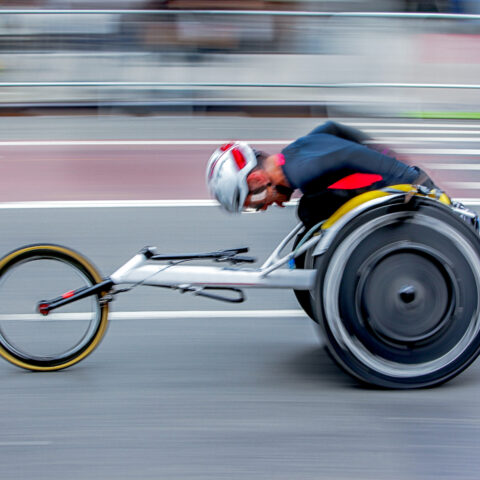 competition wheelchair in motion blur at the stadium